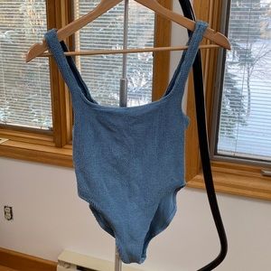 Youswim aplomb in plume